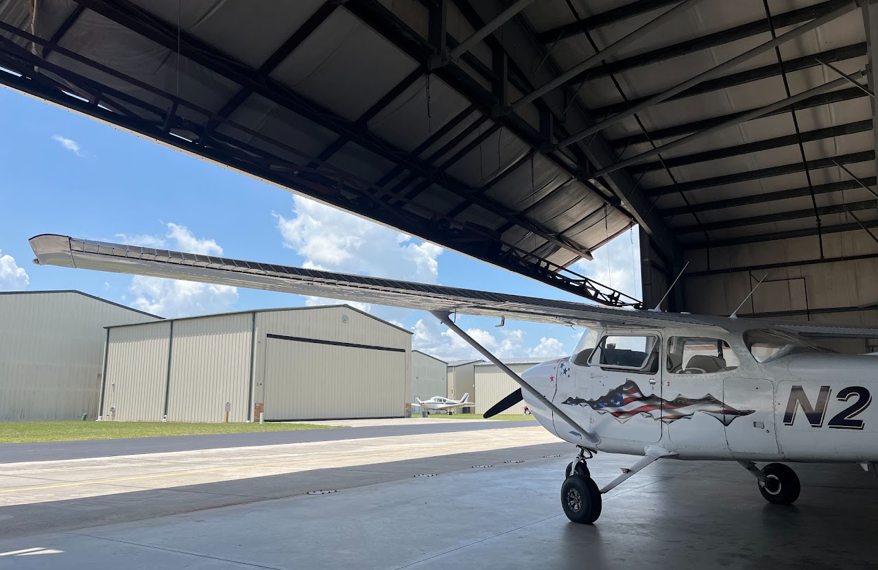 Cessna aircraft parked inside a hangar