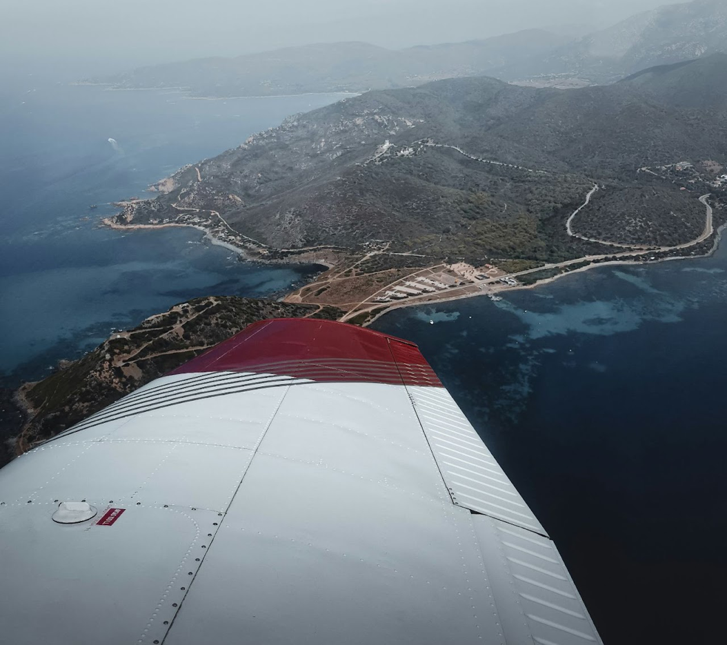 View over the wing of a general aviation aircraft in flight